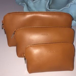Furla three piece cosmetic bag set